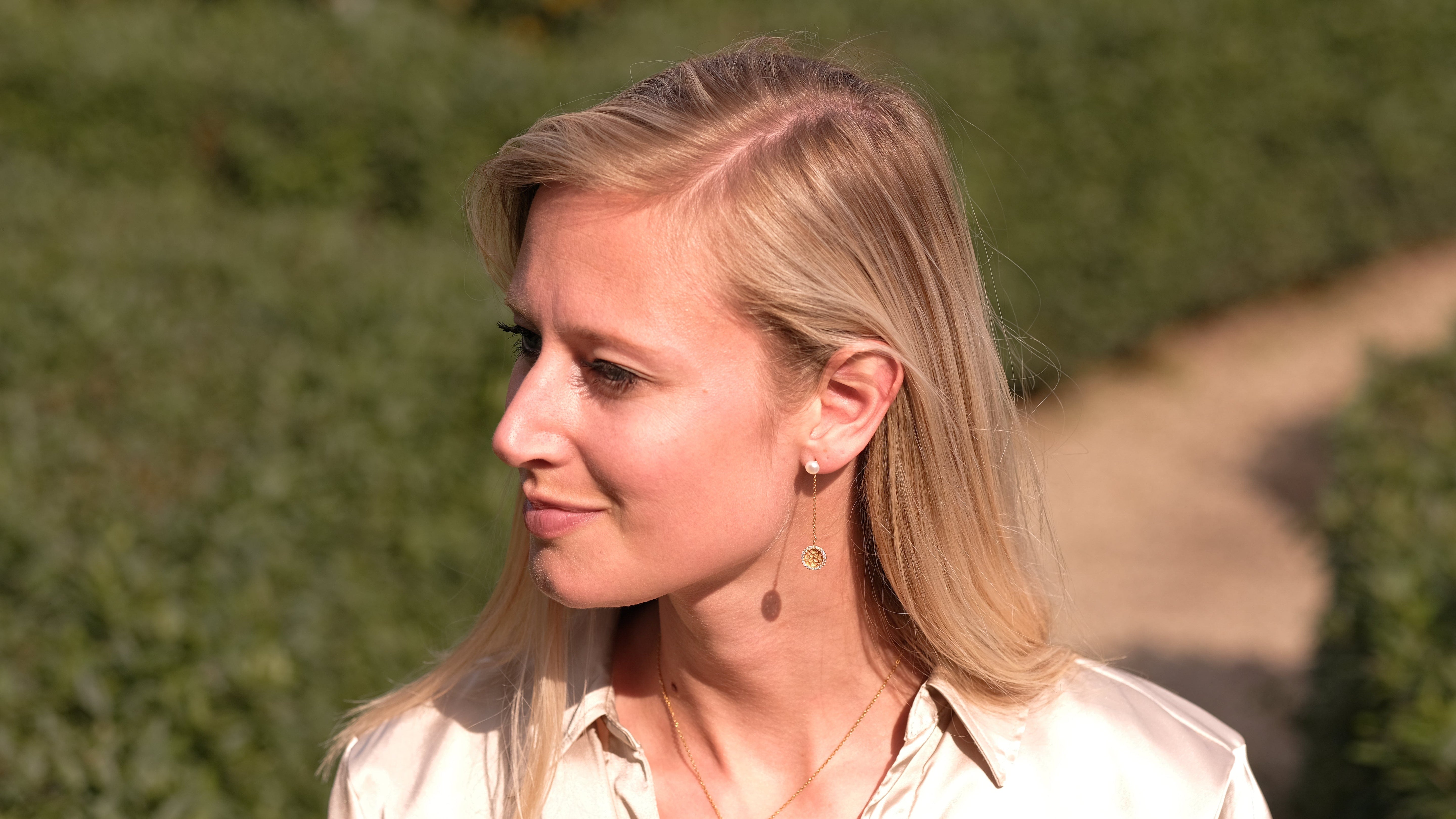 Dreamcatcher oorbellen met parel en zirkonia's verguld Nana