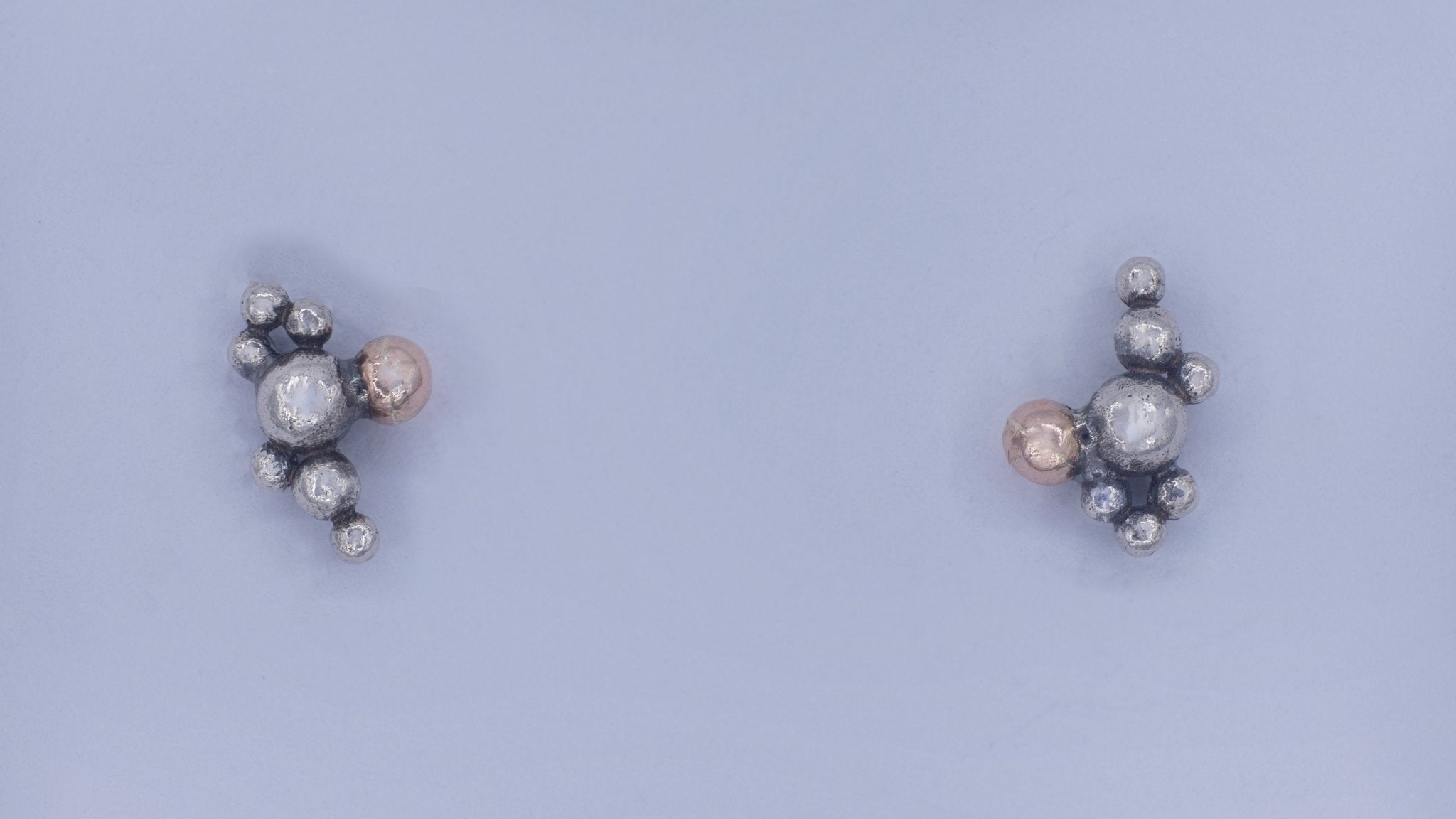 Kleine zilveren oorbellen met bubbels - Dona Aurora