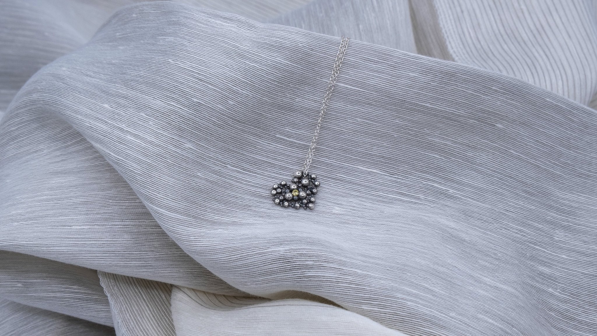 Zilveren ketting met hartje en zirkonia’s - Dona Aurora