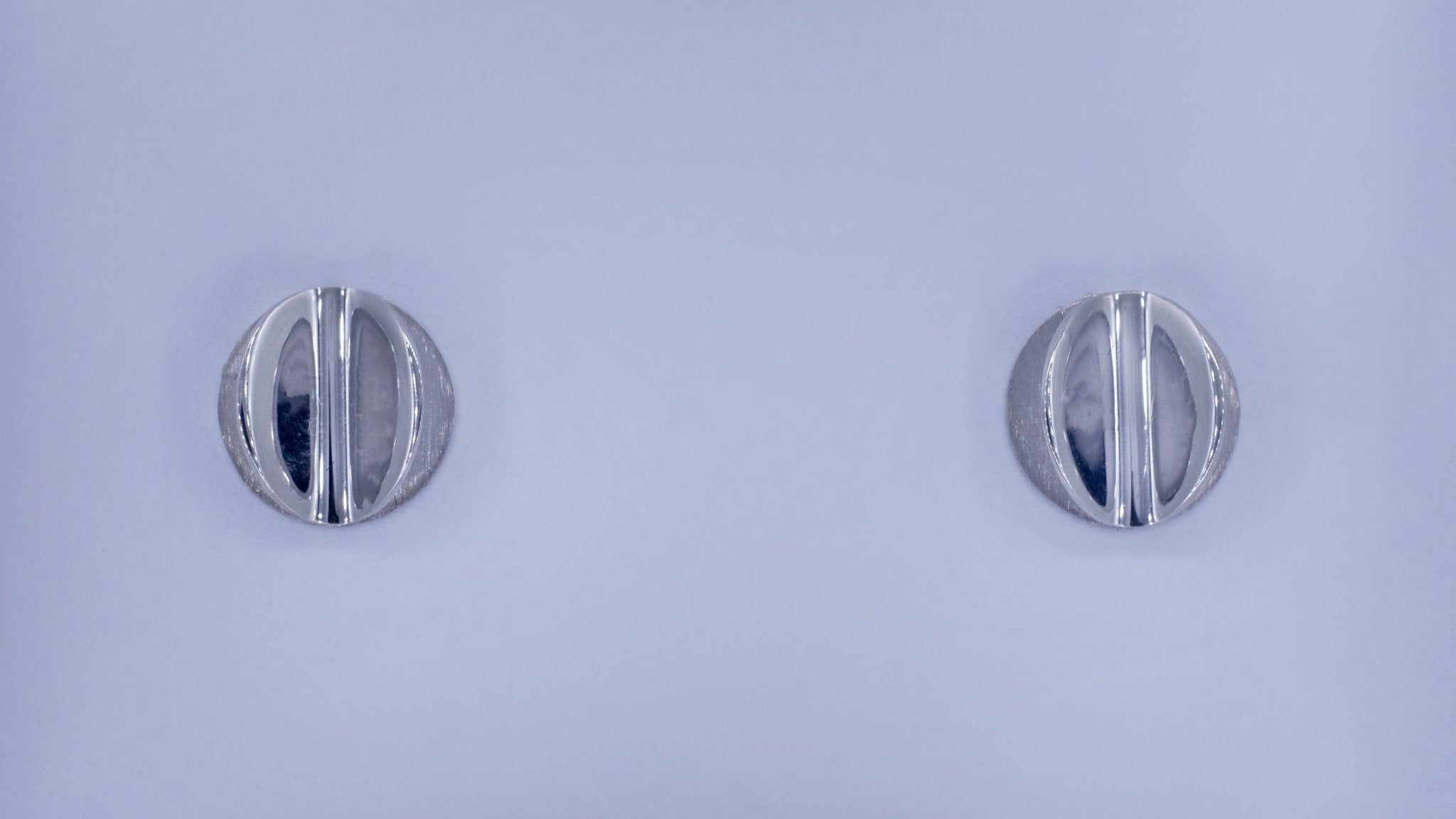 Zilveren knopjes oorbellen - Dona Aurora