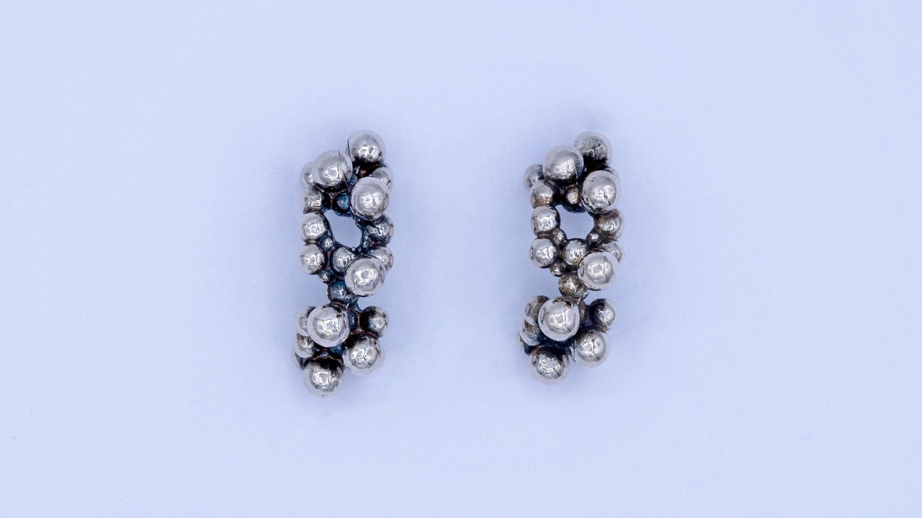 Zilveren oorringen met bubbels - Dona Aurora