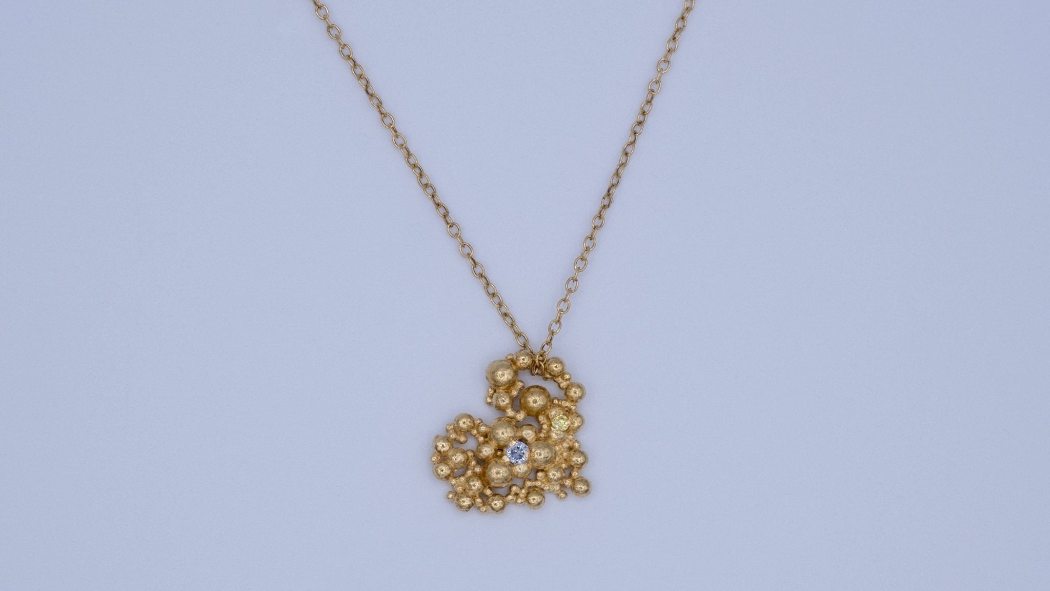 Vergulde ketting met hartje en zirkonia’s - Dona Aurora